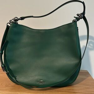 Green Coach leather pursue